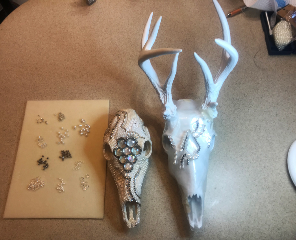 Bead selection and initial design for Frozen In Time, a whitetail deer skull mount.